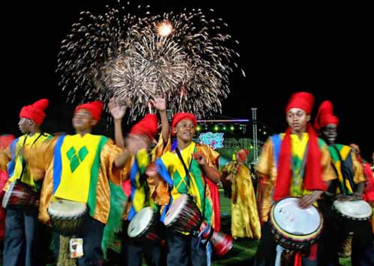 Dancers perform as fireworks illuminate the night sky during the opening ceremony of the 2007 World Cup Cricket, Trelawny, March 11, 2007