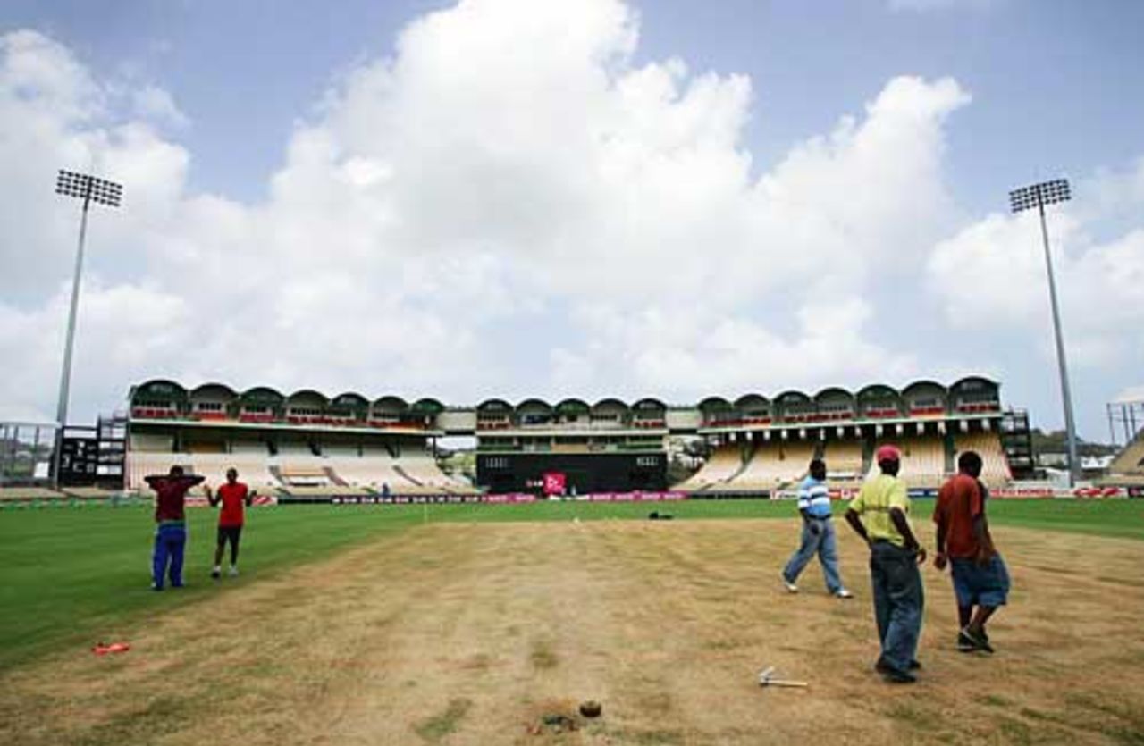 Groundstaff apply finishing touches at the Beausejour Stadium, 2007 World Cup, St Lucia, March 12, 2007