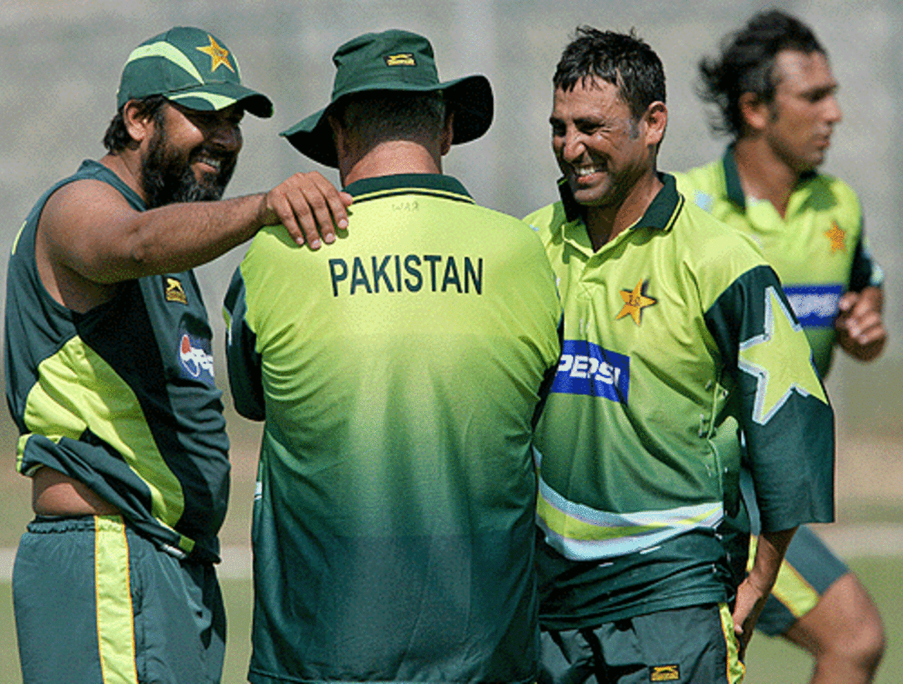Inzamam-ul-Haq and Younis Khan share a joke with Pakistan coach Bob Woolmer, at Kingston, March 12, 2007