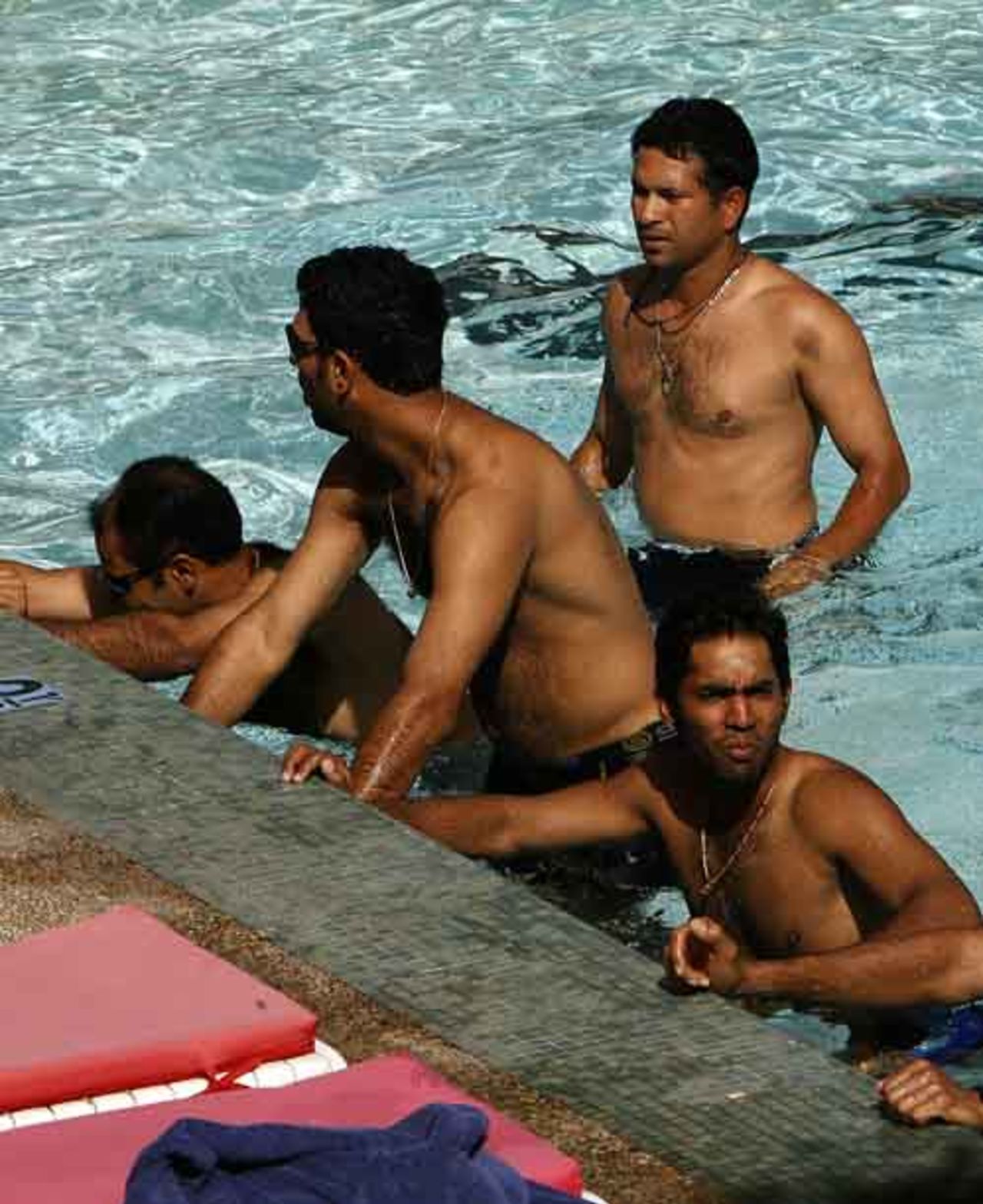India's cricketers relax in the swimming pool ahead of their opening match, Port-of-Spain, March 13, 2007