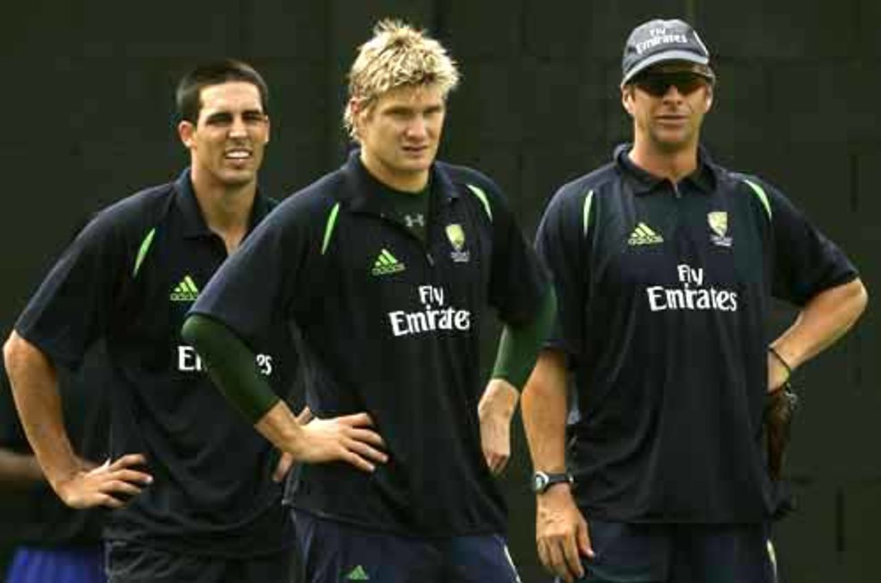 Mitchell Johnson, Shane Watson and Troy Cooley, the bowling coach, watch a training session, St Kitts, March 13, 2007