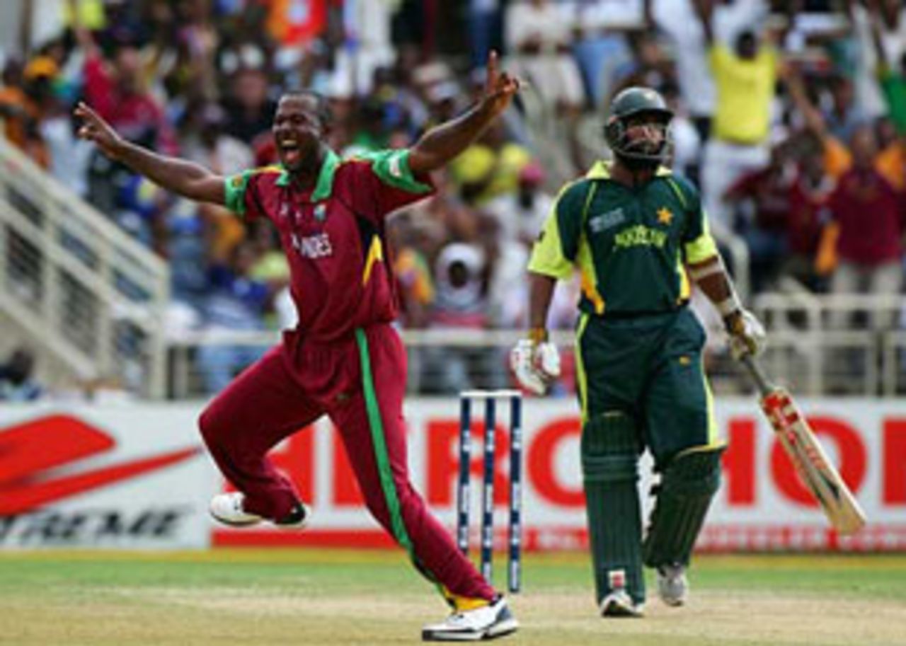 Dwayne Smith sets off in celebration after shifting Mohammad Yousuf, West Indies v Pakistan, Group D, Kingston, 2007 World Cup, March 13, 2007