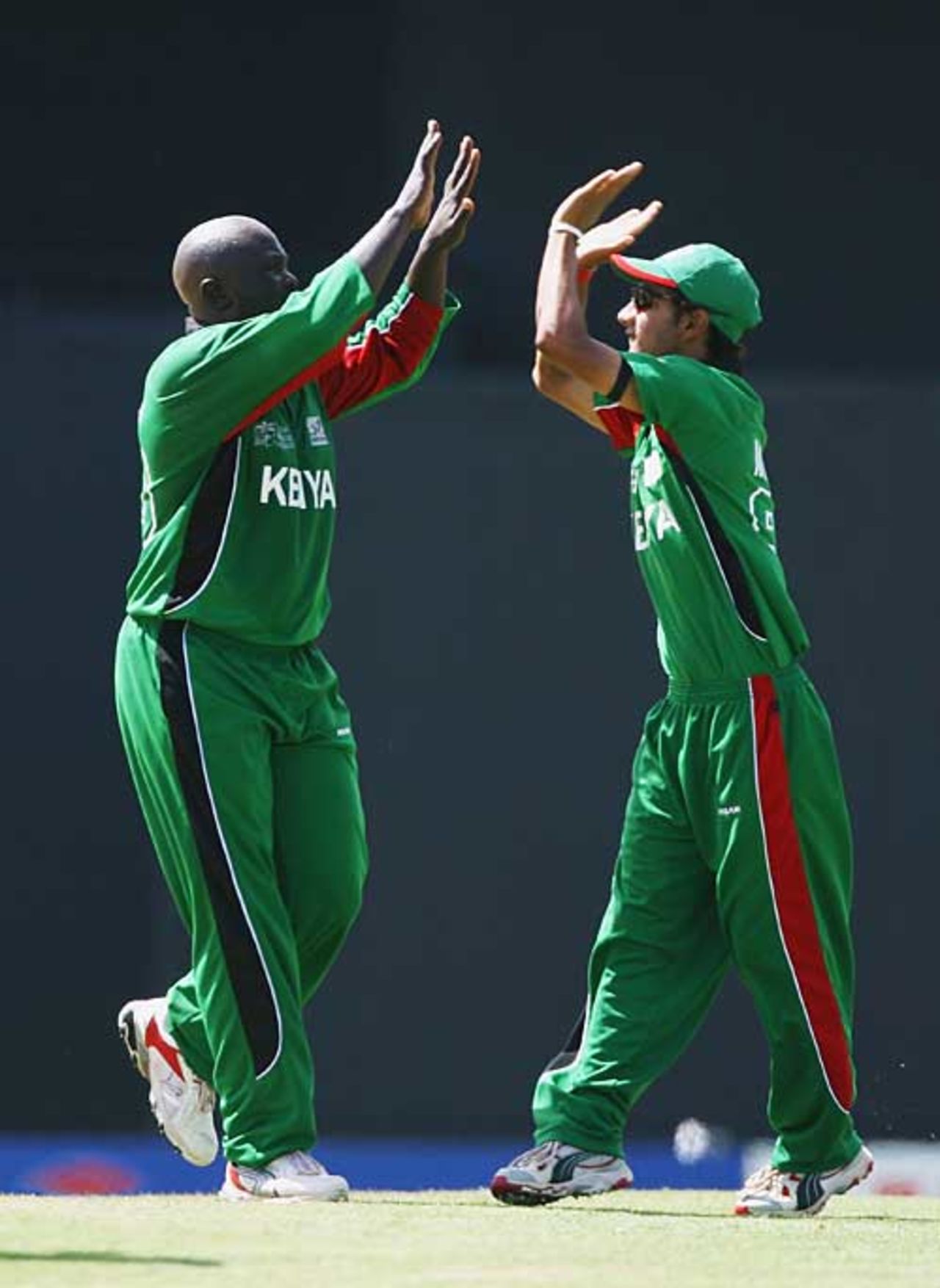 Thomas Odoyo and Tanmay Mishra celebrate the wicket of Abdool Samad, Kenya v Canada, World Cup, Group C, St Lucia, March 14, 2007