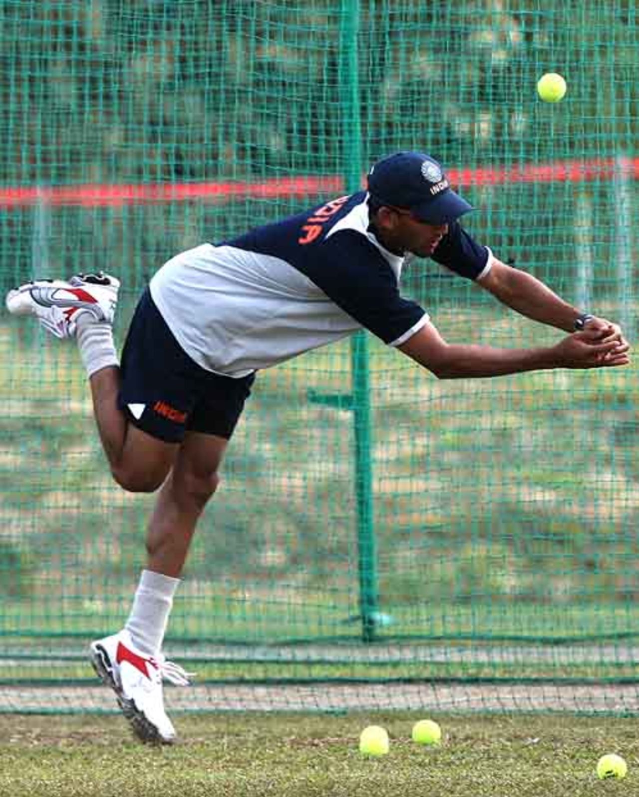 Ajit Agarkar lunges for a catch during India's practice session, Trinidad, March 14, 2007