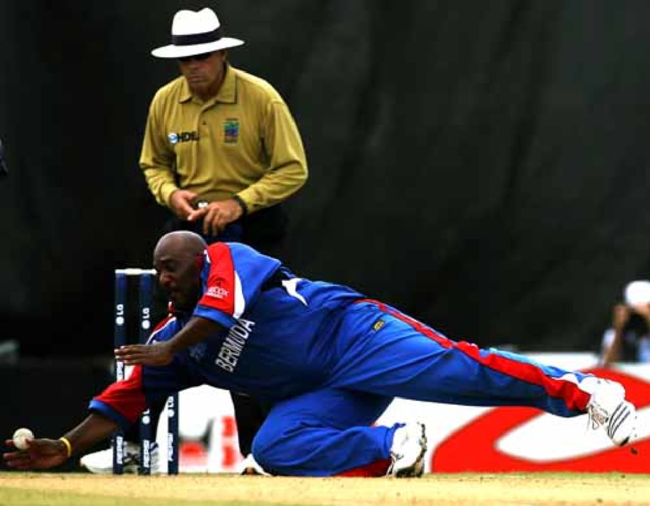 Dwayne Leverock, who dropped two catches, tries and fails to field off his own bowling, Bermuda v Sri Lanka, Group B, Port of Spain, March 15, 2007