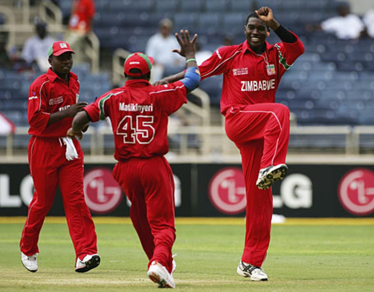 Elton Chigumbura celebrates another Ireland wicket with Stuart Matsikenyeri, Ireland v Zimbabwe, Group D, World Cup, Kingston, March 15, 2007