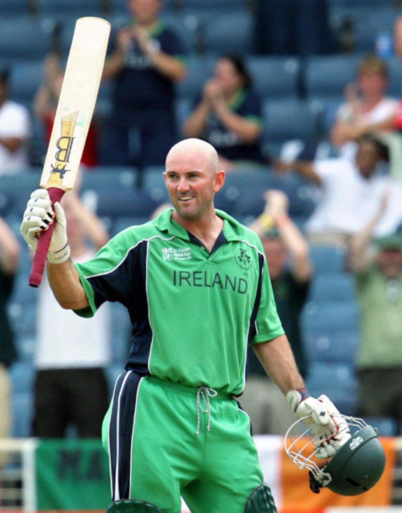 Jeremy Bray raises his bat to acknowledge the cheers of the crowd after he reached his century, Ireland v Zimbabwe, Group D, Jamaica, March 15, 2007