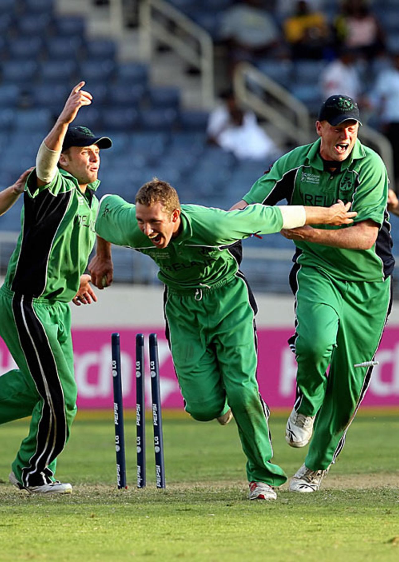Andrew White and Ireland celebrate tying their thrilling match against Zimbabwe, Ireland v Zimbabwe, World Cup, Group D, Jamaica, March 15, 2007
