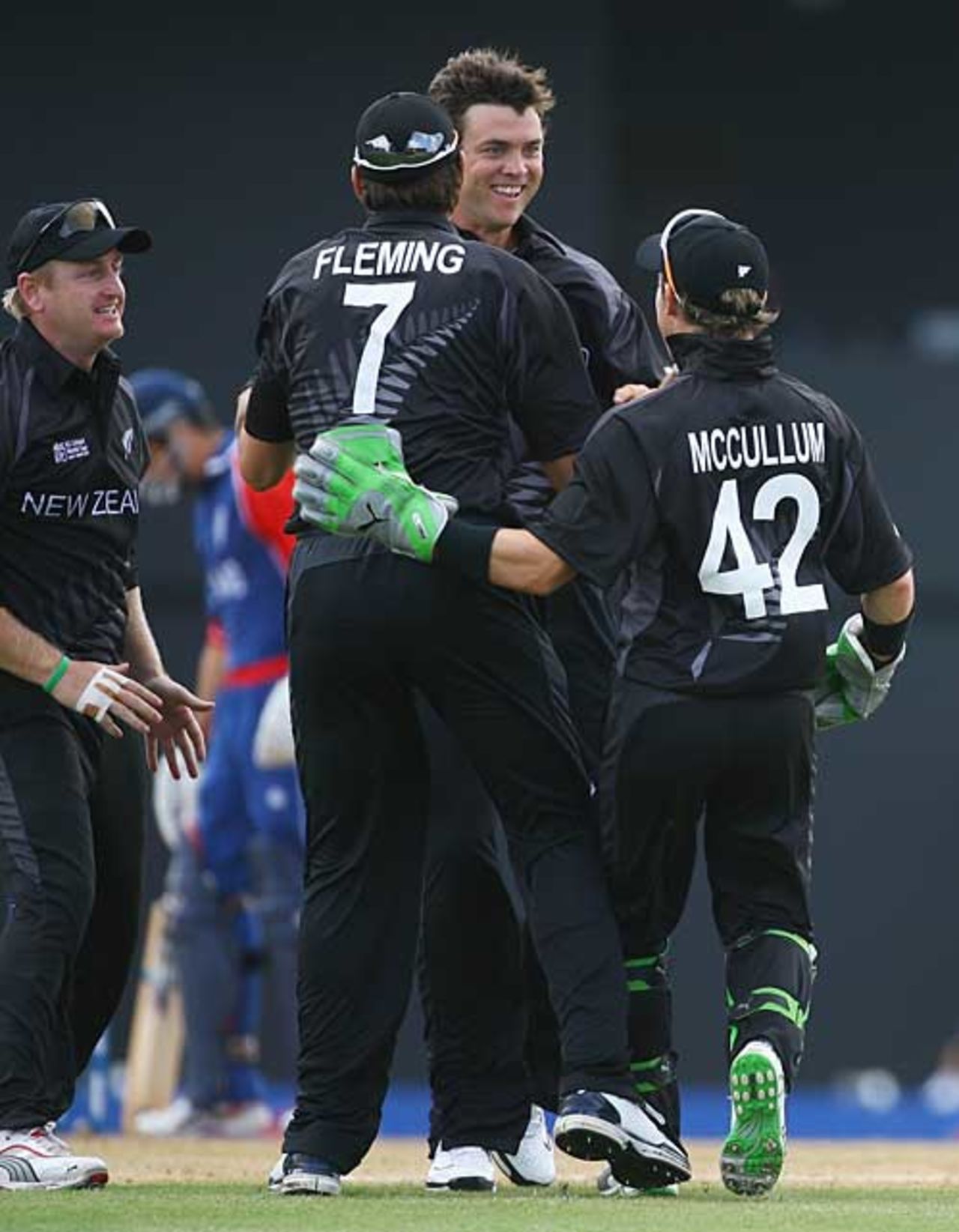 James Franklin is mobbed after his early wicket of Ed Joyce, England v New Zealand, Group C, Gros Islet, March 16, 2007