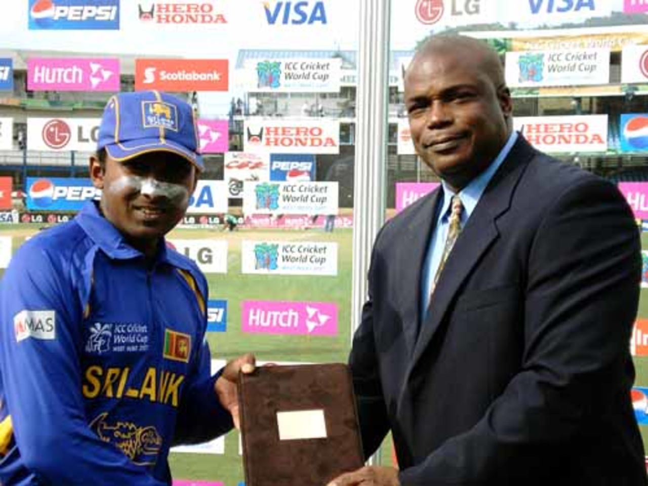 Hasely Crawford, a former Olympic gold medallist, presents the Man-of-the-Match award to Mahela Jayawaradene after Sri Lanka's 243-run win over Bermuda, Bermuda v Sri Lanka, Group B, Trinidad, March 15, 2007