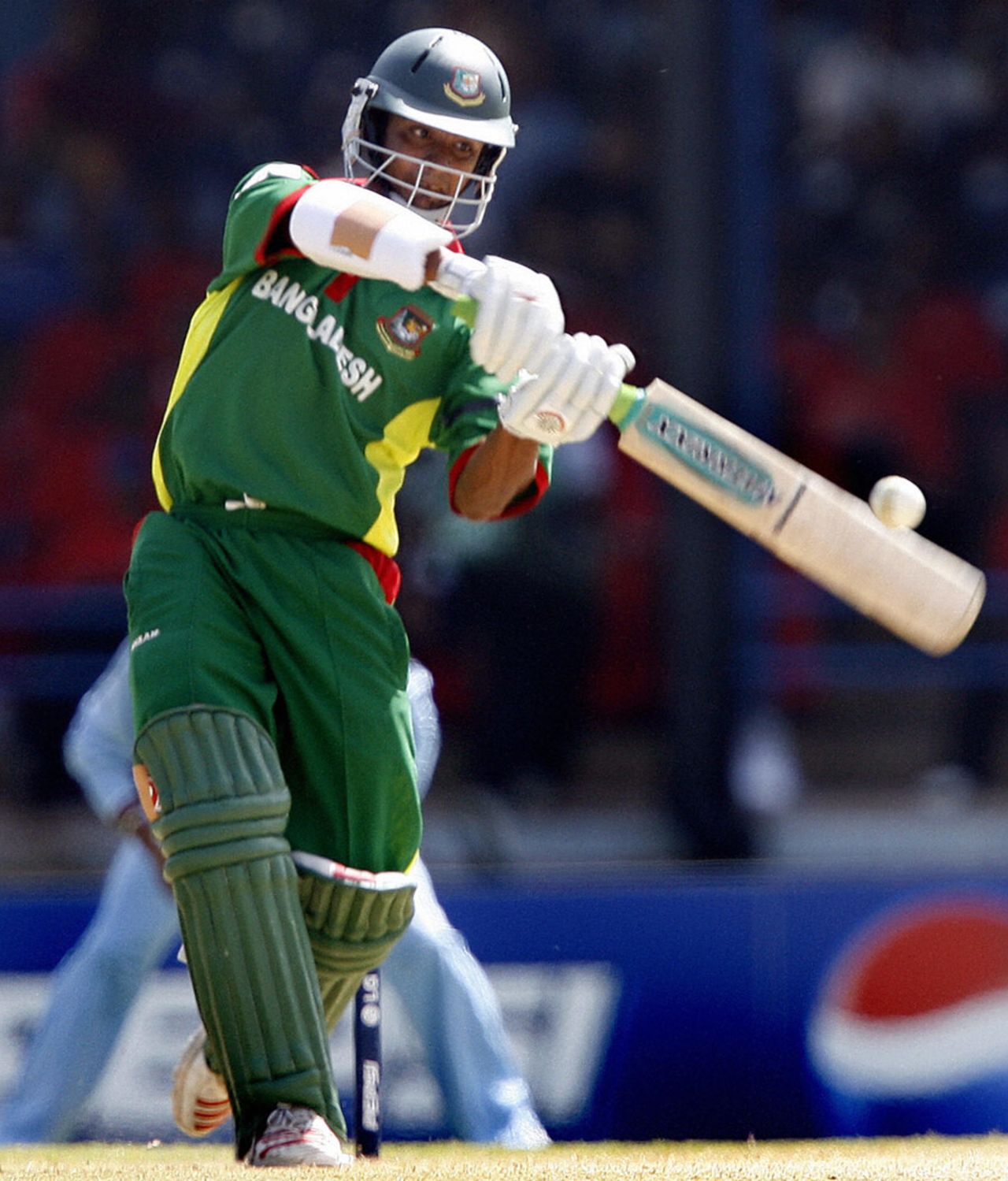 Tamim Iqbal launches into one during his ferocious 51, Bangladesh v India, Group B, Trinidad, March 17, 2007