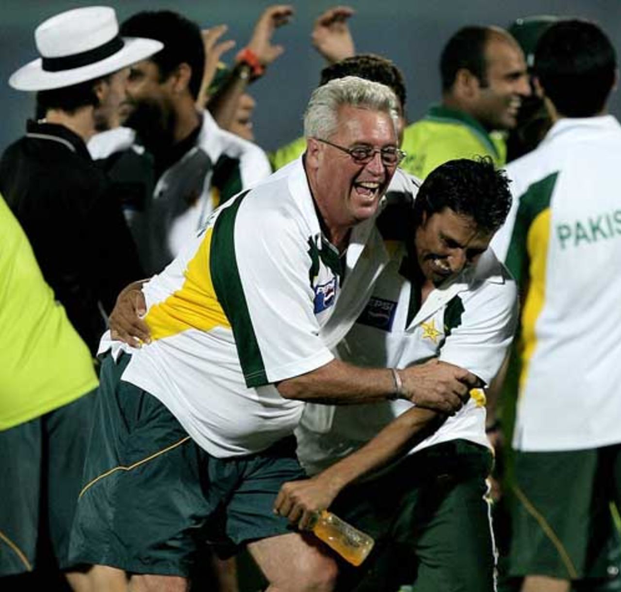 Bob Woolmer and Younis Khan celebrate the victory against Sri Lanka, Champions Trophy, October 2006
