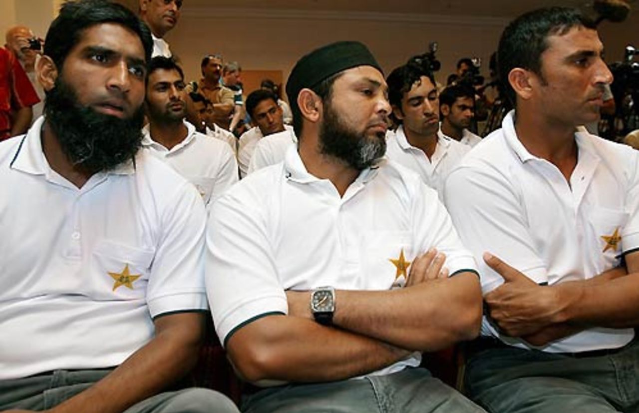 Mohammad Yousuf, Mushtaq Ahmed and Younis Khan listen to Inzamam-ul-Haq calling it quits from one-dayers, Kingston, Jamaica, March 18, 2007