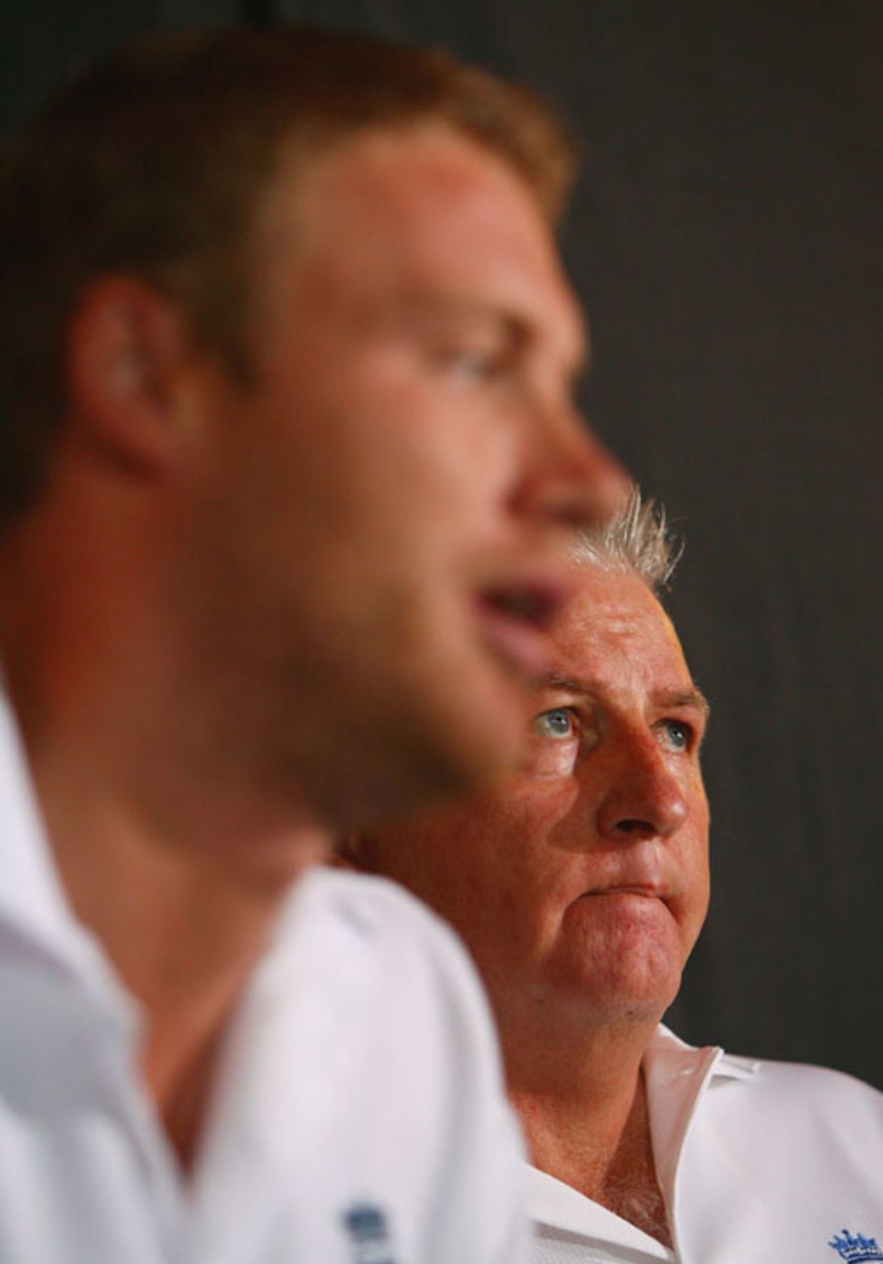 Duncan Fletcher looks on as Andrew Flintoff faces the media after being stripped of the vice-captaincy, St Lucian Rex hotel, Gros Islet, Saint Lucia, March 19, 2007