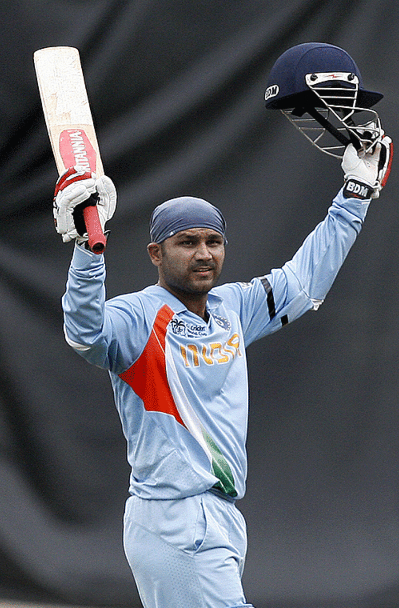 Virender Sehwag raises his bat in acknowledgement of his hundred, Bermuda v India, Group B, Trinidad, March 19, 2007