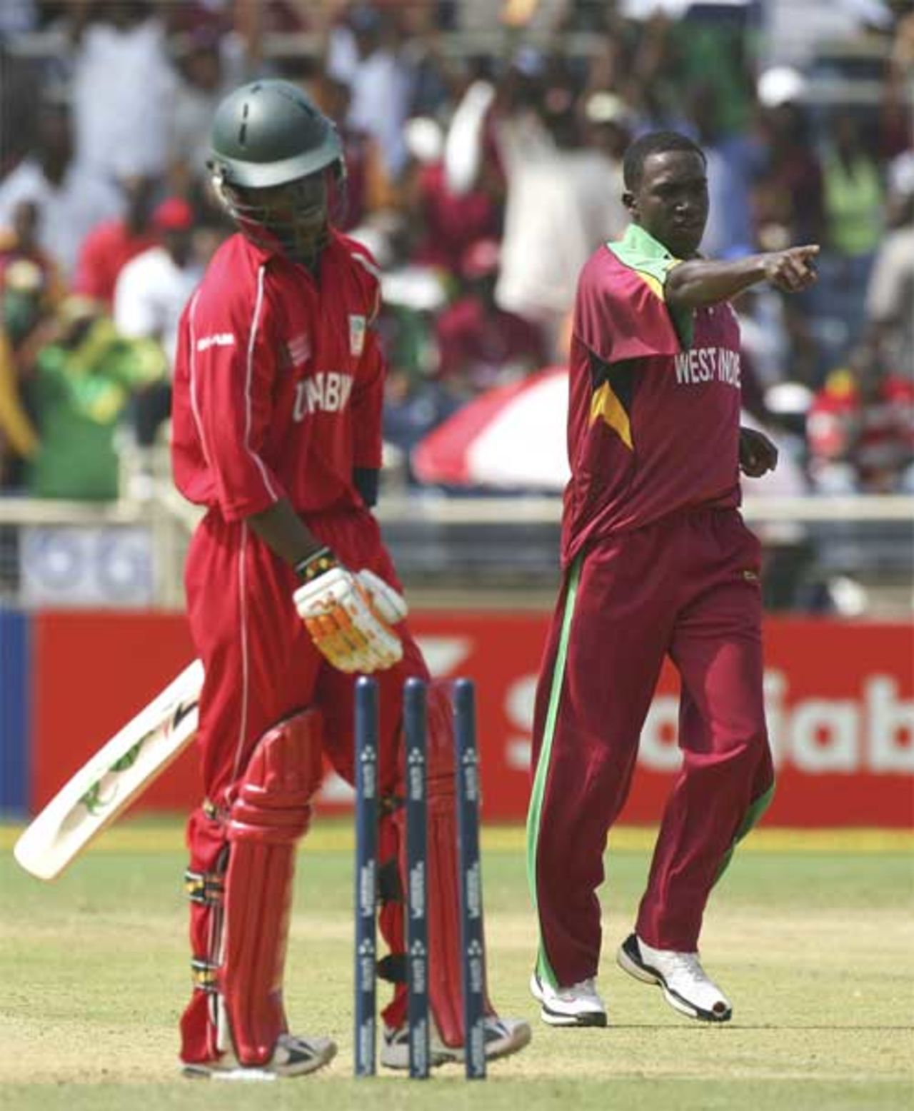 Chamu Chibhahba is cleaned up by Jerome Taylor, West Indies v Zimbabwe, Group D , Jamaica, March 19, 2007