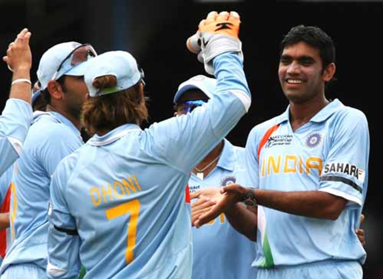 Munaf Patel is congratulated by team-mates after taking the wicket of Delyone Borden, Bermuda v India, Group B, Trinidad, March 19, 2007