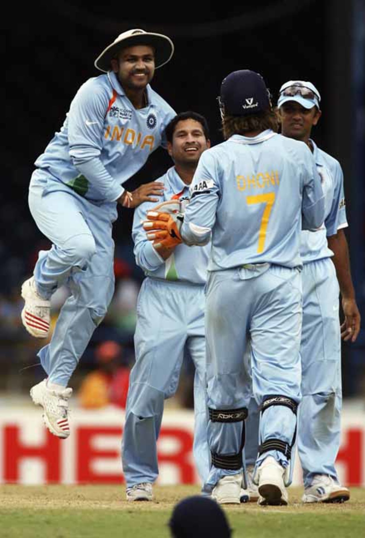 Sachin Tendulkar is 'mobbed'  after dismissing Dwayne Leverock, Bermuda v India, Group B, Trinidad, March 19, 2007