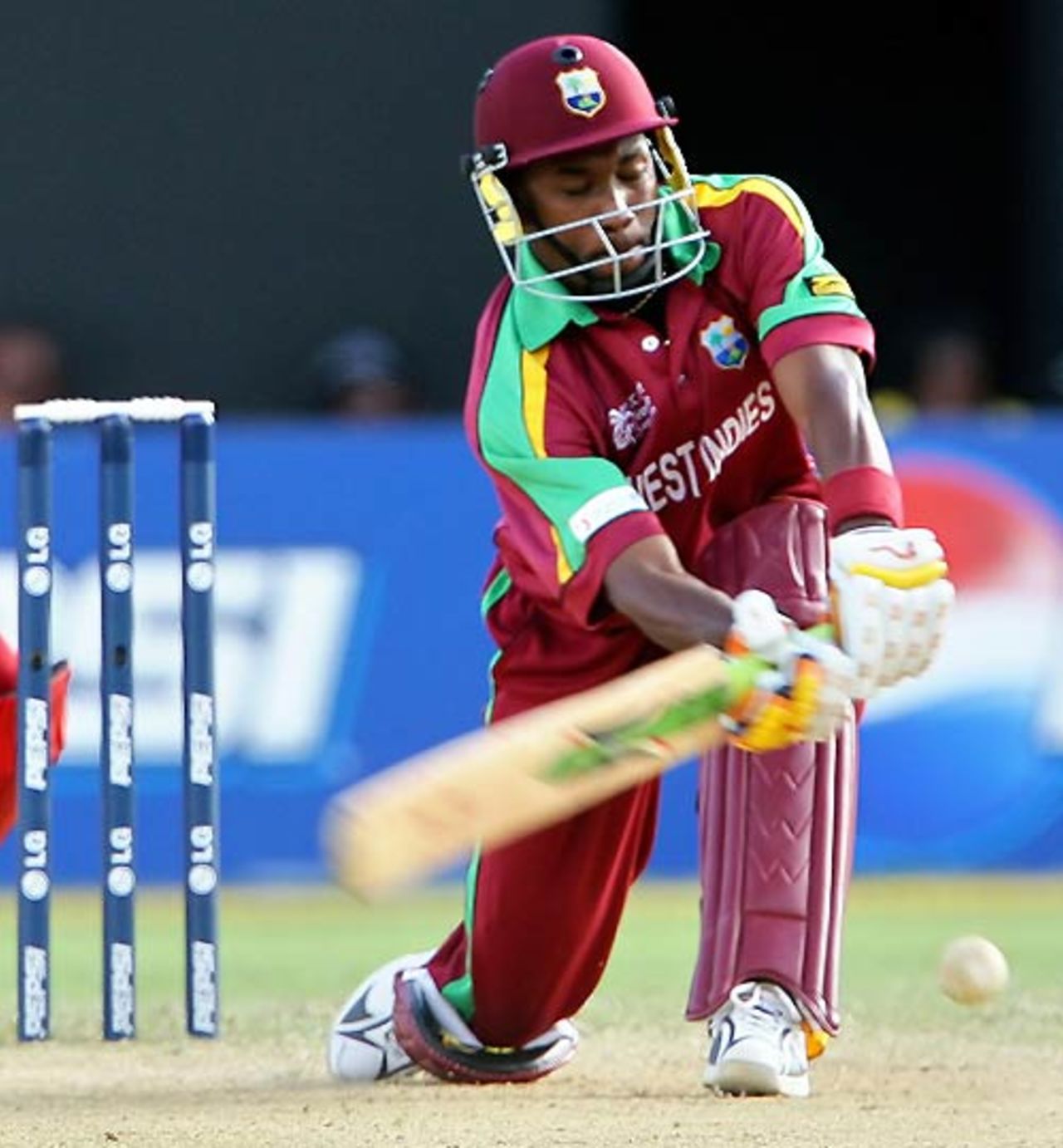 Dwayne Bravo sweeps during his controlled 36, West Indies v Zimbabwe, Group D , Jamaica, March 19, 2007