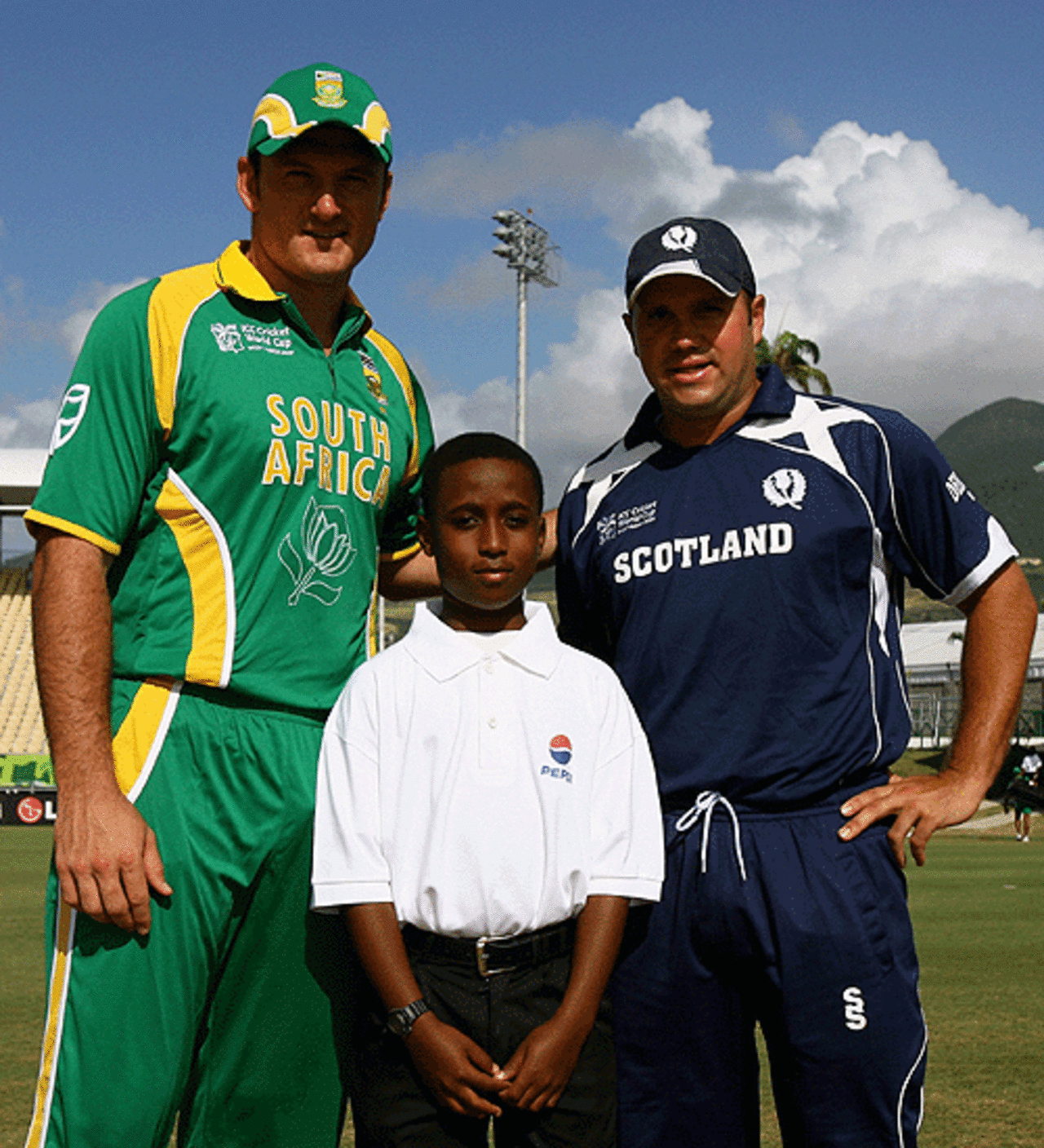 Graeme Smith and Ryan Watson pose along with the mascot ahead of their match, Scotland v South Africa, Group A, St Kitts, March 20, 2007