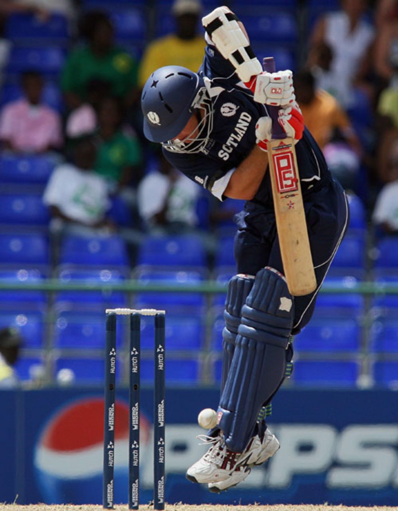 Dougie Brown leaps in the air to keep one out, Scotland v South Africa, Group A, St Kitts, March 20, 2007