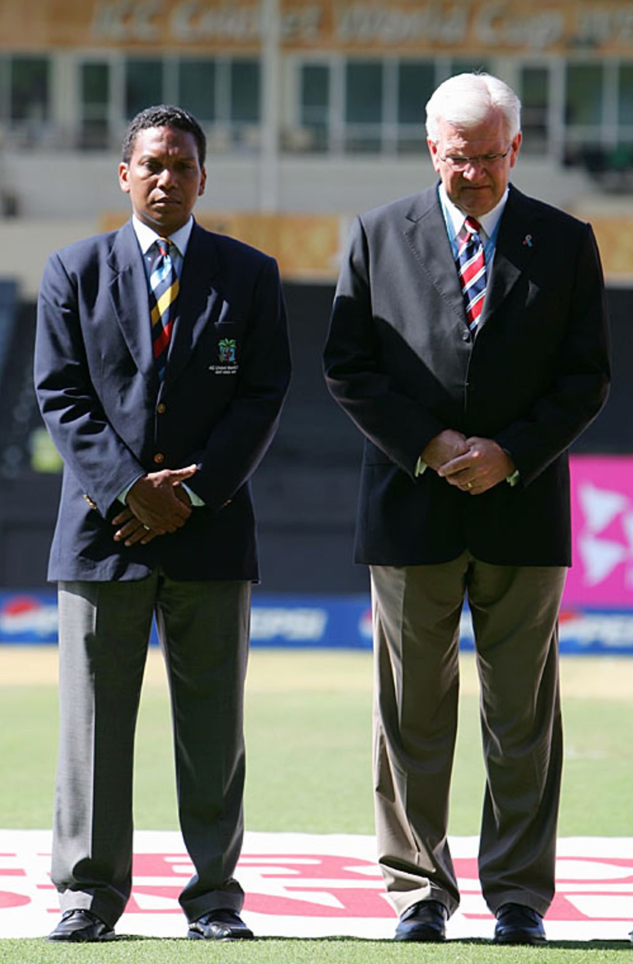 Chris Dehring and Malcolm Speed observe a minute's silence in memory of Bob Woolmer, Pakistan v Zimbabwe, Group D, World Cup, Kingston, March 21, 2007