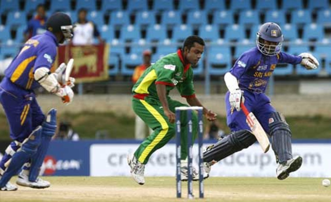 Syed Rasel tries unsuccessfully to pick up the ball to run out Upul Tharanga, Bangladesh v Sri Lanka, Group B, Trinidad, March 21, 2007 