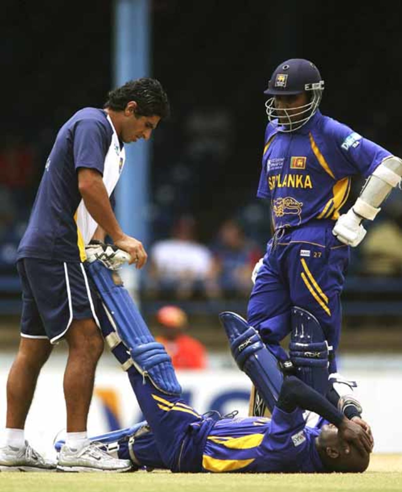 Sanath Jayasuriya receives medical attention after he twisted his knee, Bangladesh v Sri Lanka, Group B, Trinidad, March 21, 2007