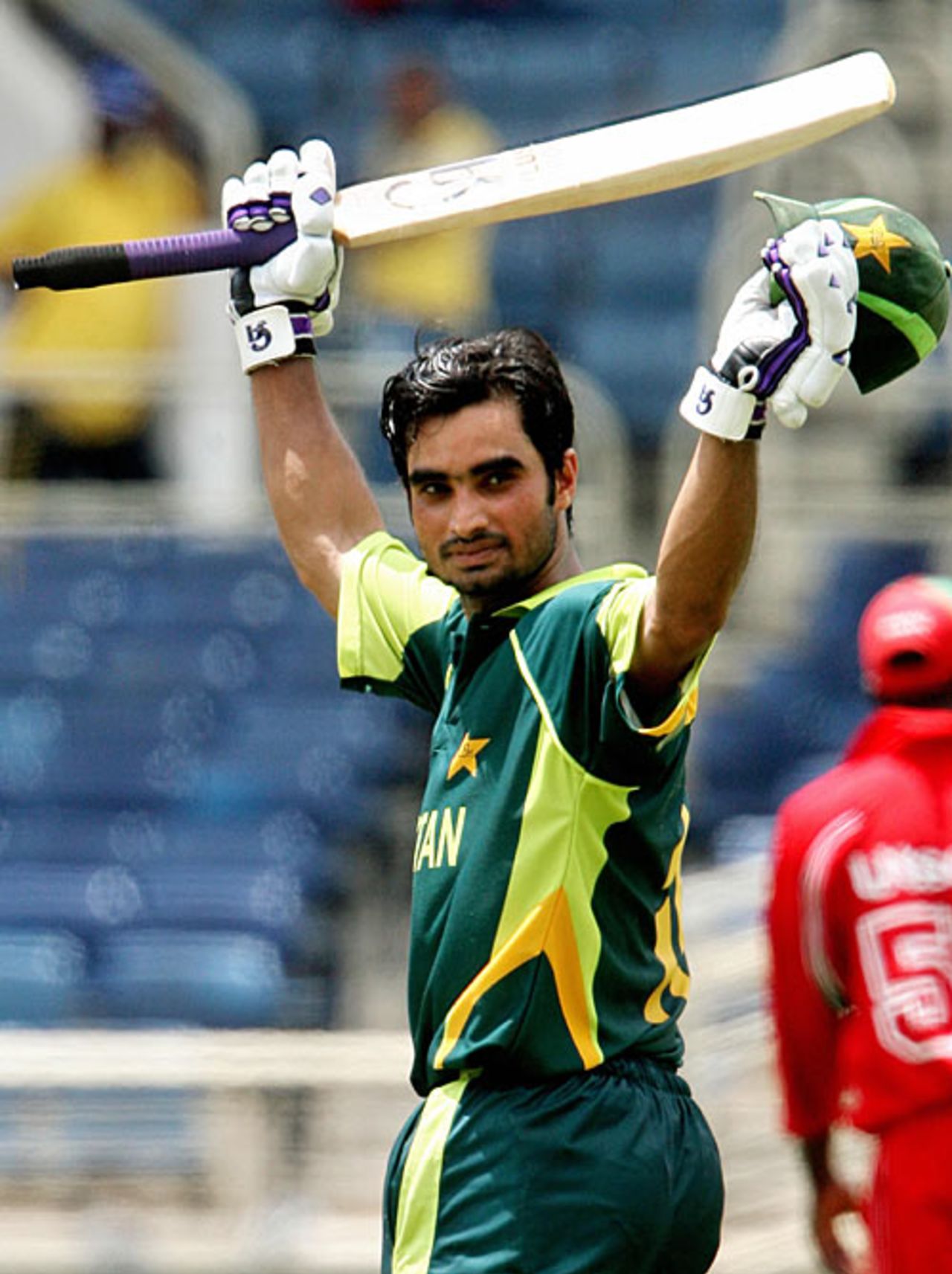 Imran Nazir raises his arms to celebrate his hundred against Zimbabwe, Pakistan v Zimbabwe, Group D, World Cup, Kingston, March 21, 2007