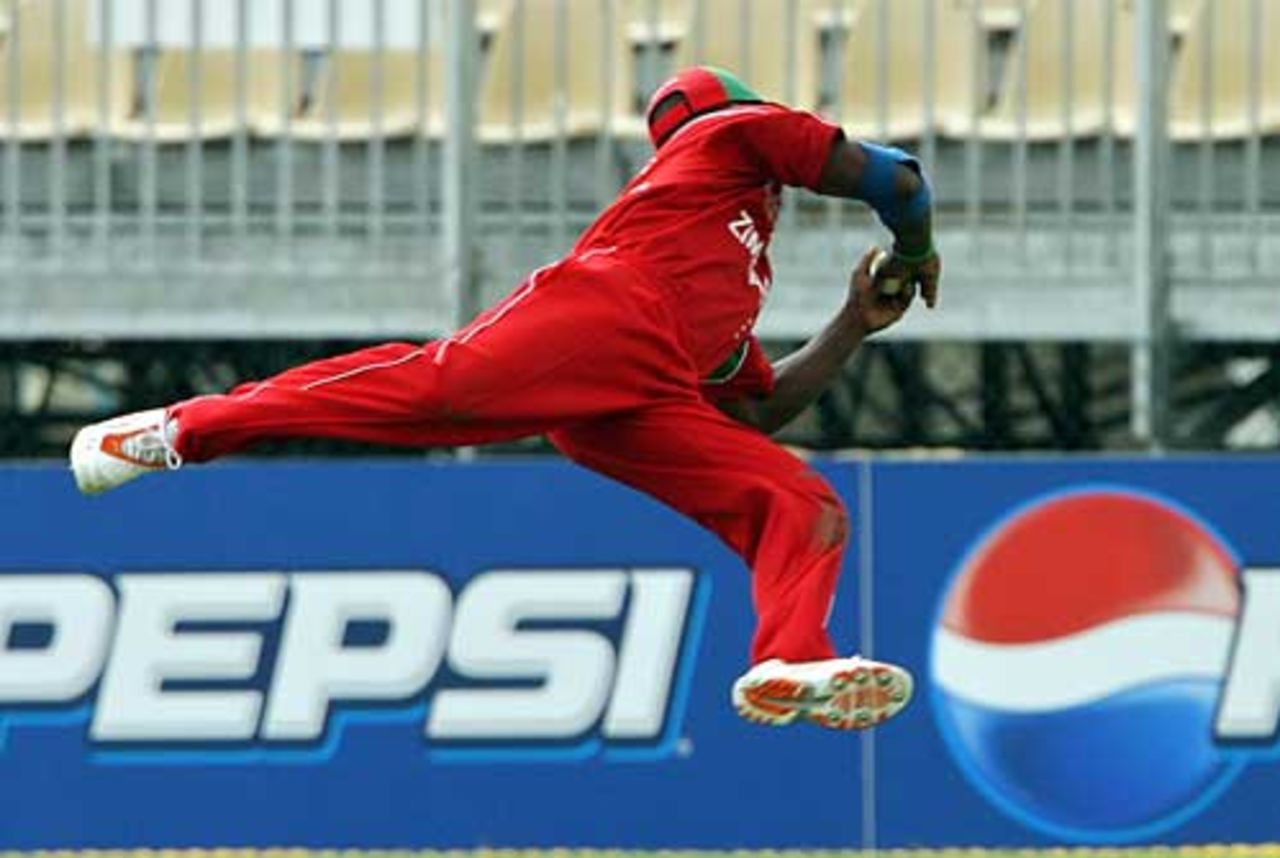 Stuart Matsikenyeri flies through the air to remove Imran Nazir, Pakistan v Zimbabwe, Group D, World Cup, Kingston, March 21, 2007