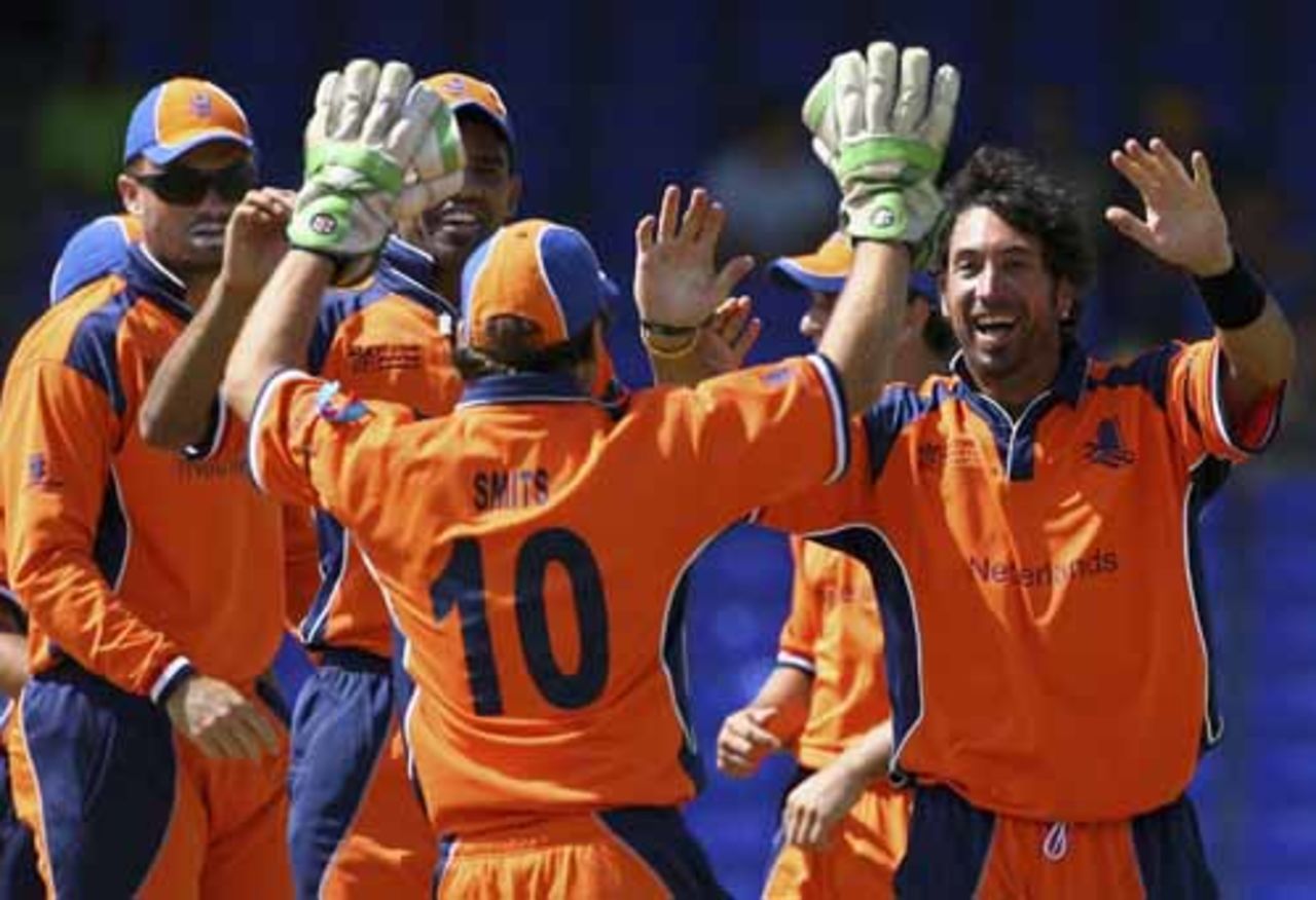 Billy Stelling runs to his captain of the day, Jeroen Smits, after picking up a wicket, Netherlands v Scotland, Group A, St Kitts, March 22, 2007