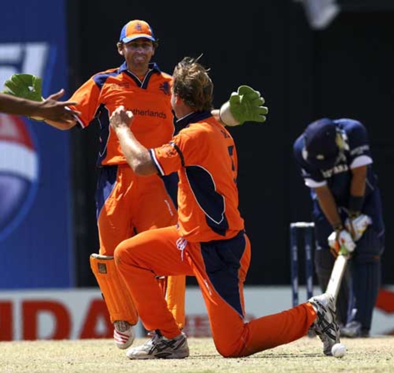 Tim de Leede pulls off a stunning return catch and Ryan Watson can't believe his luck after striking the ball so firmly, Netherlands v Scotland, Group A, St Kitts, March 22, 2007