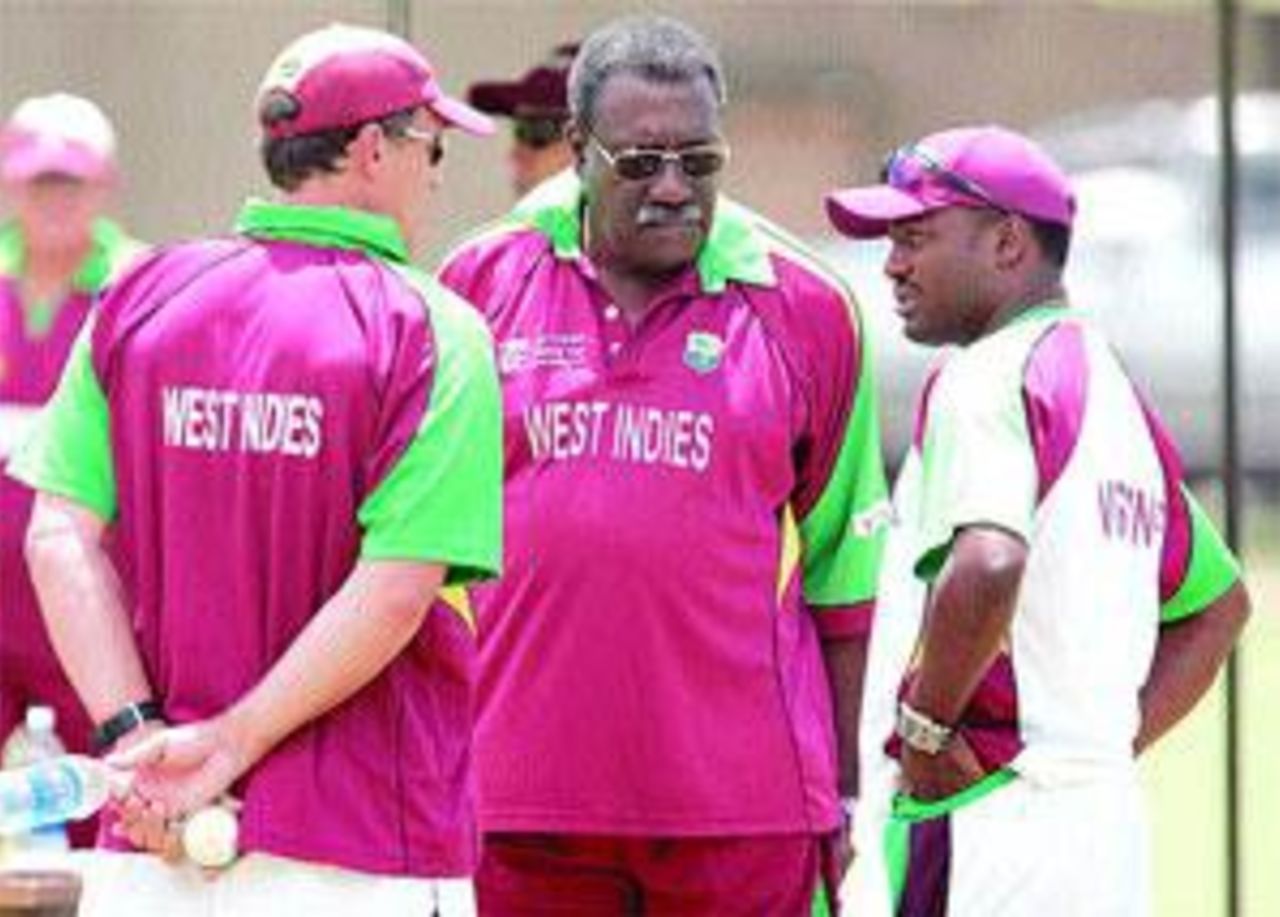 Brian Lara chats with Clive Lloyd and Bennett King during practice, Kingston, Jamaica, March 22, 2007