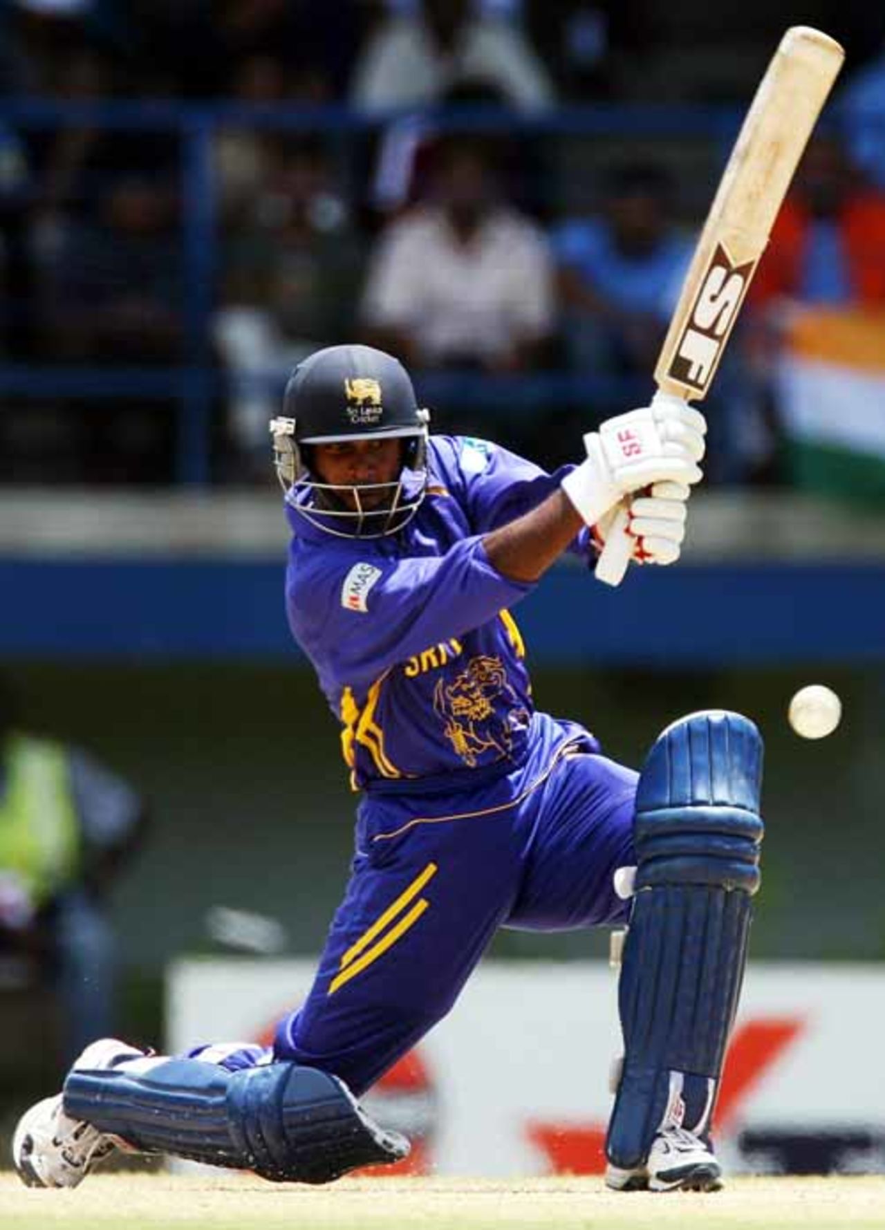 Chamara Silva packs a punch with this drive past the infield on the off side, India v Sri Lanka, Group B, Trinidad, March 23, 2007 