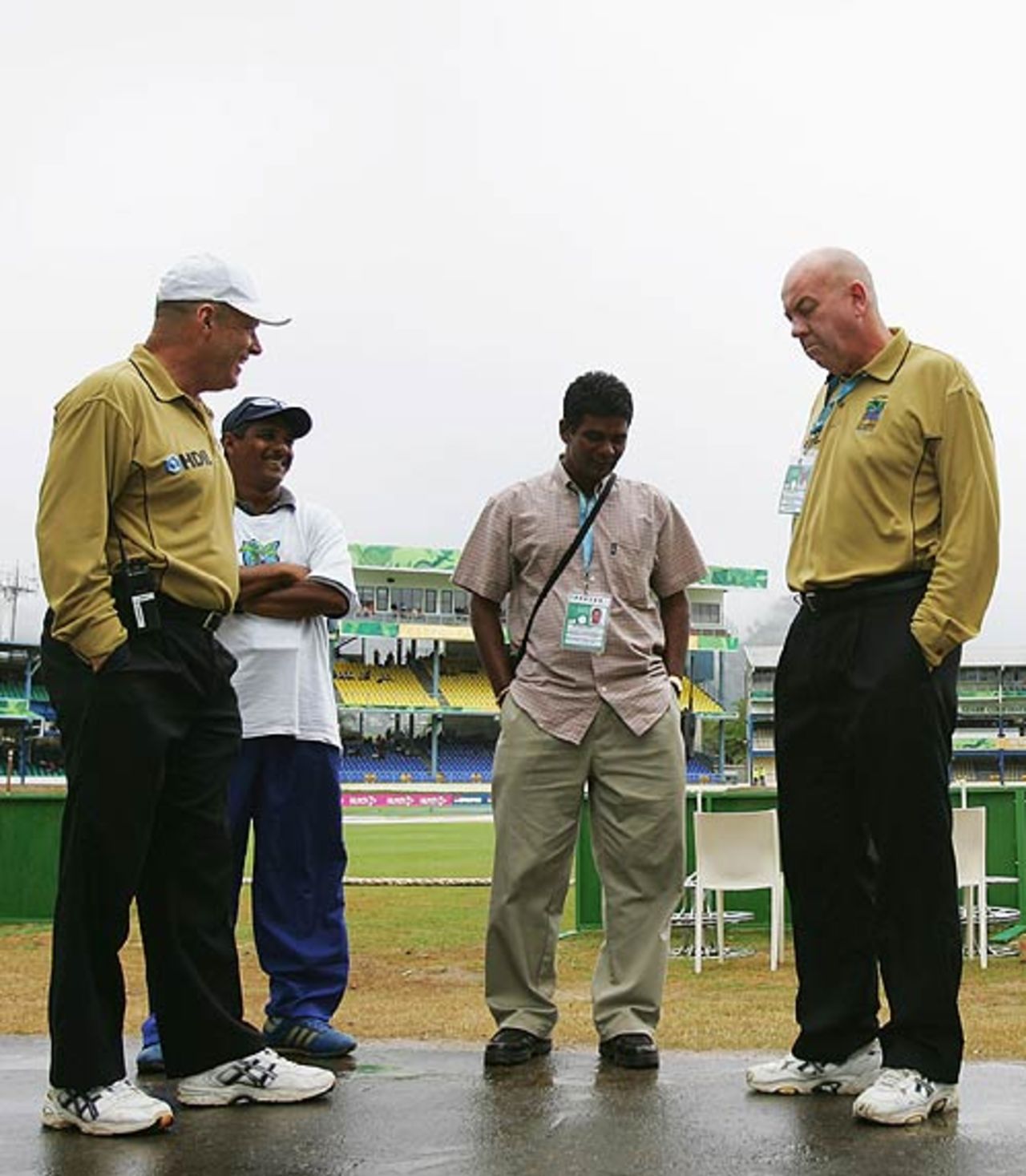 The umpires inspect the wet conditions in Trinidad, Bangladesh v Bermuda, Trinidad, March 25, 2007