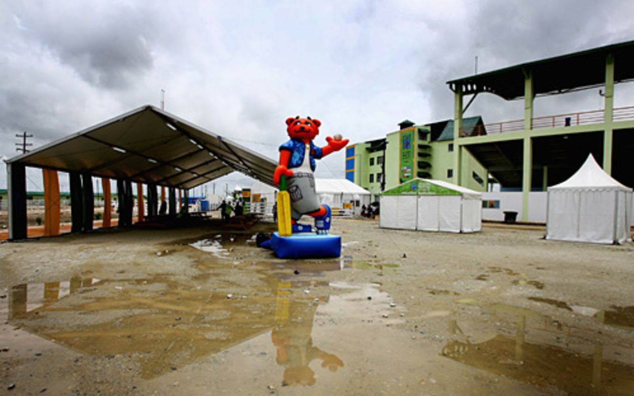Mello, the World Cup mascot, sits among the puddles at Providence Stadium, 2007 World Cup, Guyana, March 26, 2007