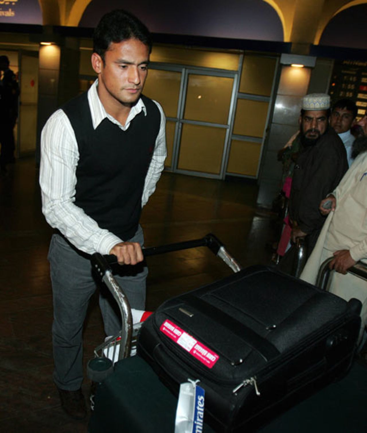 Pakistan's Yasir Arafat arrives back at Islamabad airport, March 28, 2007