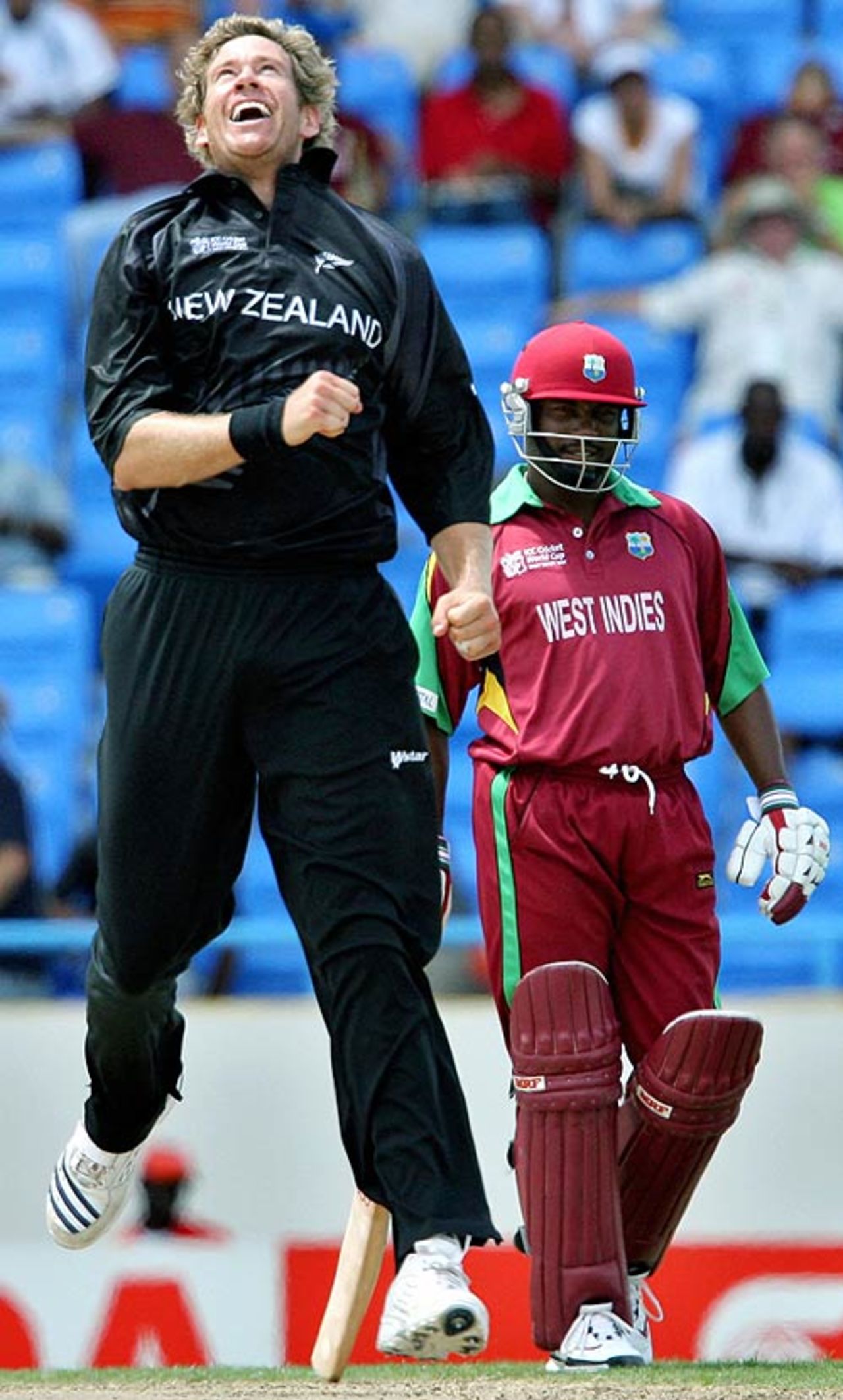Jacob Oram jumps for joy at removing Chris Gayle, while Brian Lara watches on, West Indies v New Zealand, Super Eights, Antigua, March 29, 2007