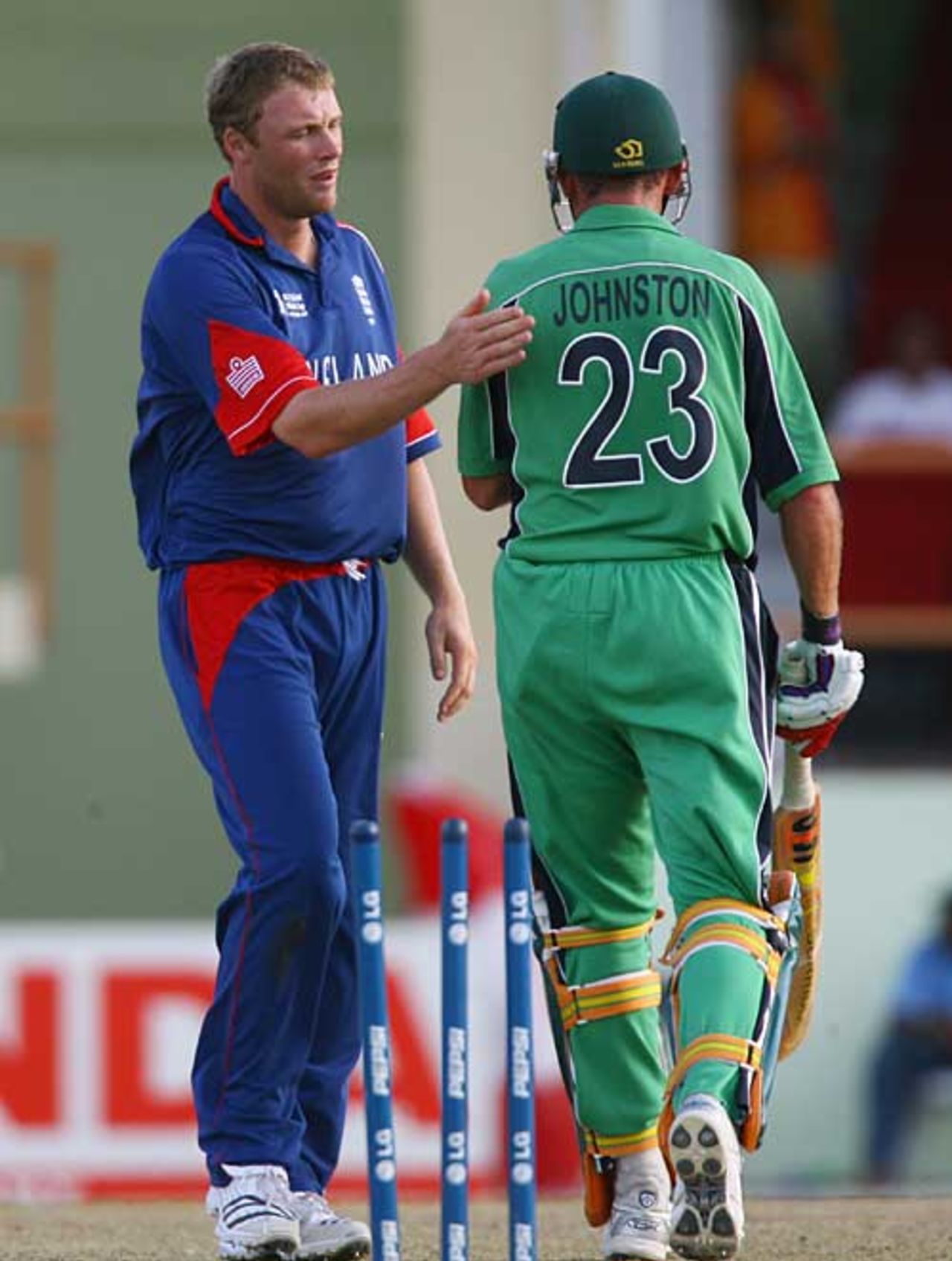 Andrew Flintoff offers Trent Johnston a consoling pat on the back, England v Ireland, Super Eights, Guyana, March 30, 2007