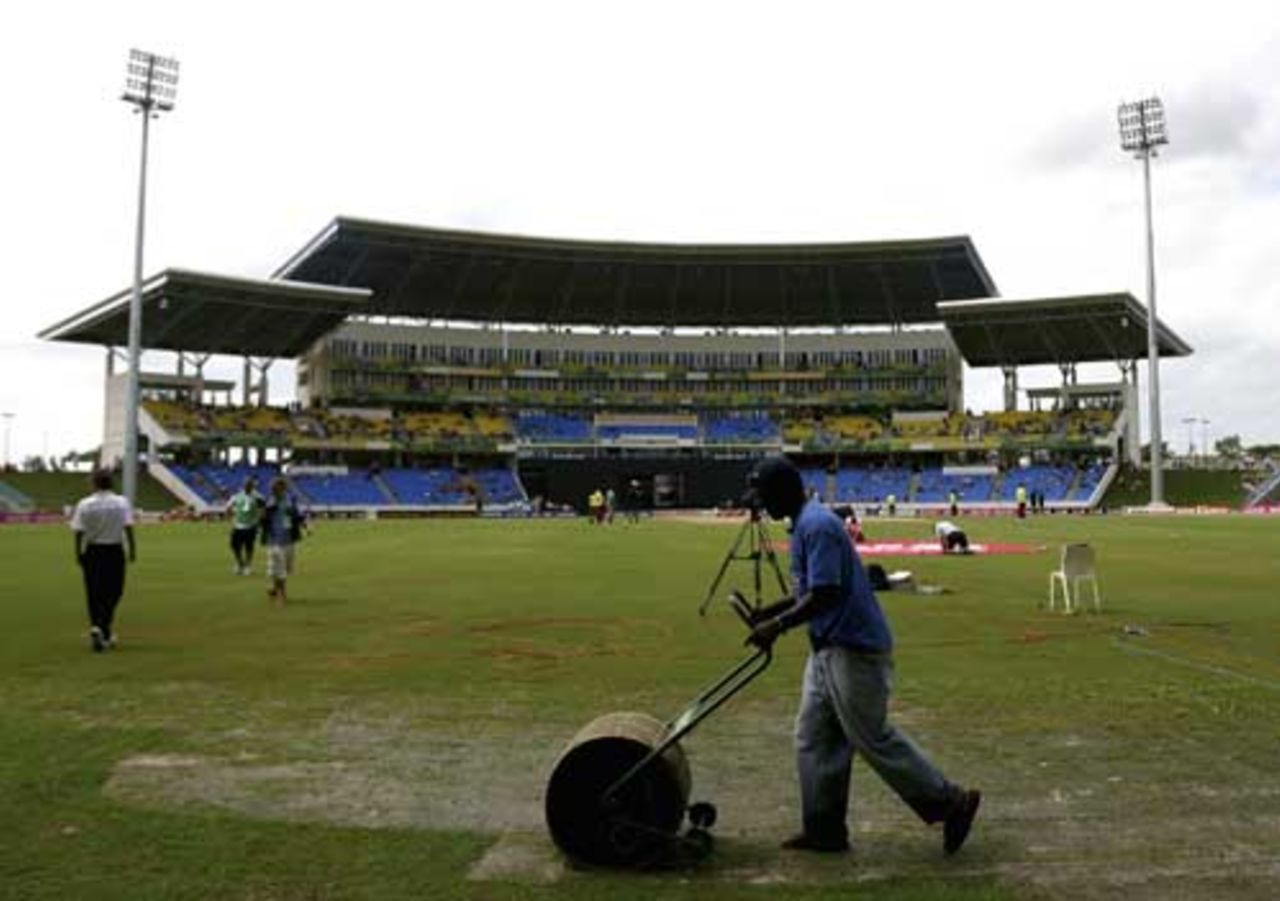 Ground staff work at getting the ground ready for play, Australia v Bangladesh, Super Eights, Antigua, March 31, 2007