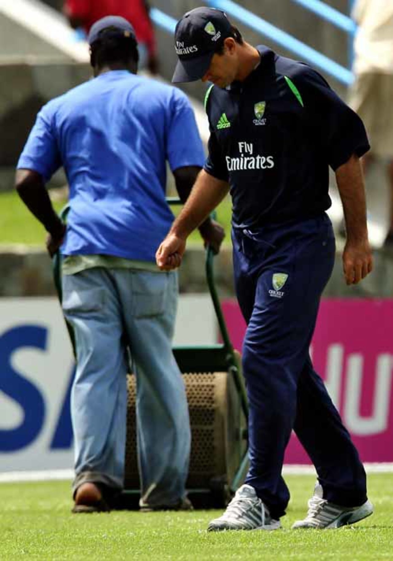 Ricky Ponting inspects the ground after the Super Eights match between Australia and Bangladesh is delayed due to a wet outfield, Australia v Bangladesh, Super Eights, Antigua, March 31, 2007