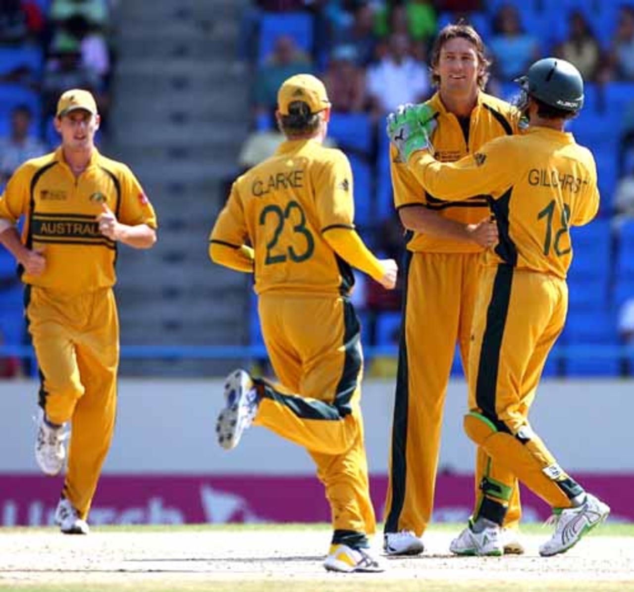 Glenn McGrath is congratulated by his teammates on passing Wasim Akram's World Cup record of 54 wickets, Australia v Bangladesh, Super Eights, Antigua, March 31, 2007
