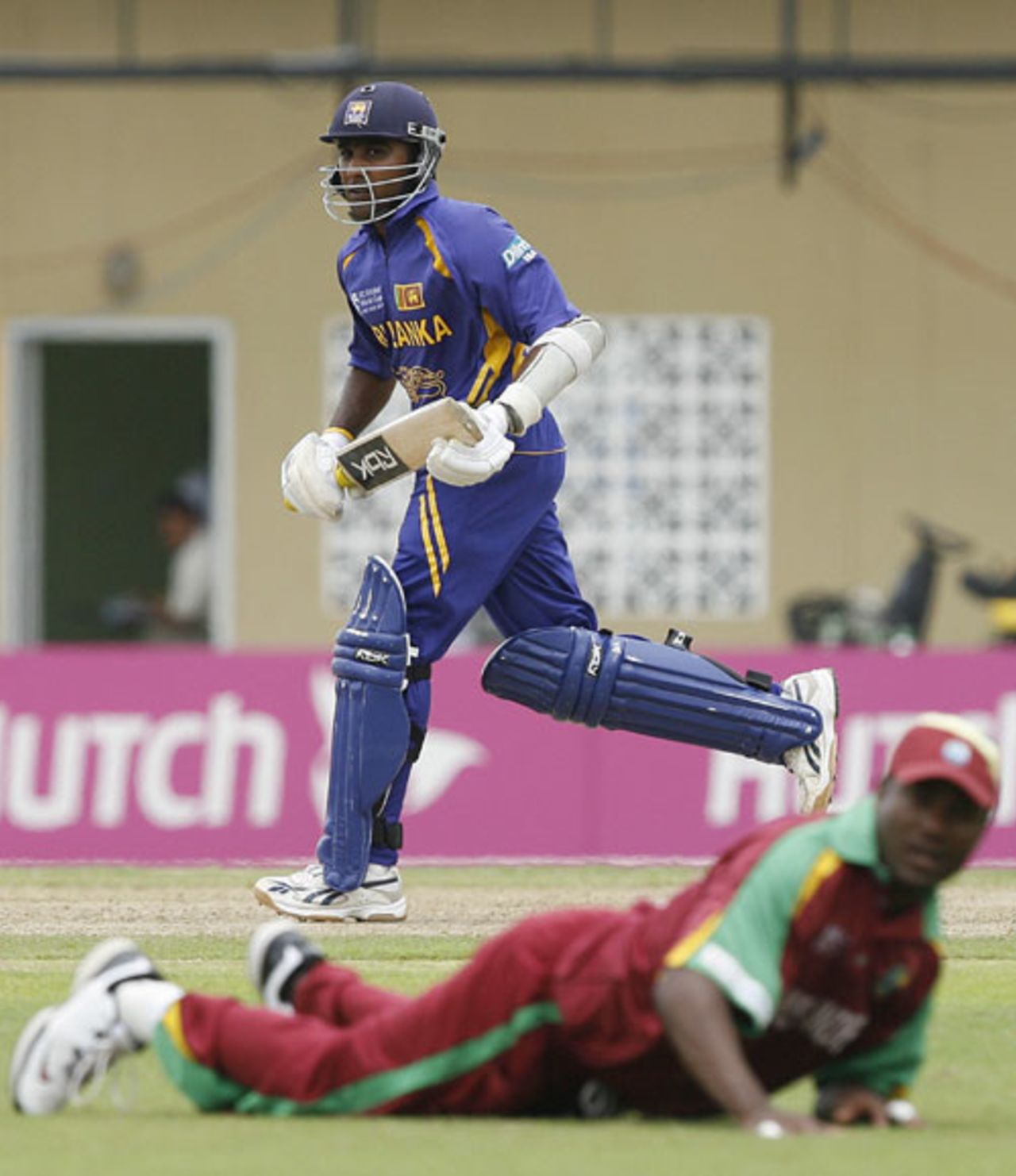 Mahela Jayawardene runs a single past a beaten Brian Lara, West Indies v Sri Lanka, Super Eights, Guyana, April 1, 2007