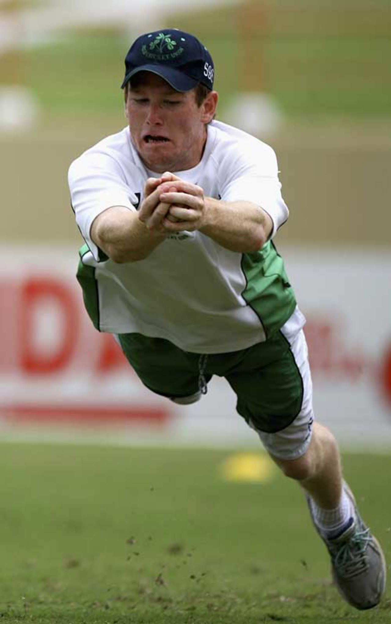 Eoin Morgan leaps for a catch during Ireland's training session, Guyana, April 2, 2007