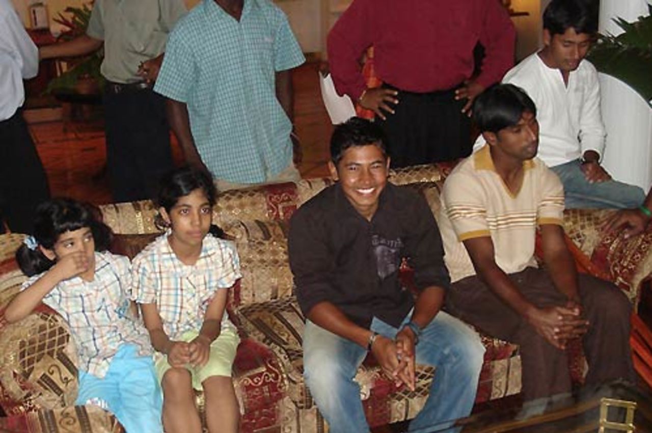 Mushfiqur Rahim, Tapash Baisya and Mohammad Ashraful pose with two Bangladeshi kids in the lobby of the Pegasus Le Meridien, Guyana, April 6, 2007 