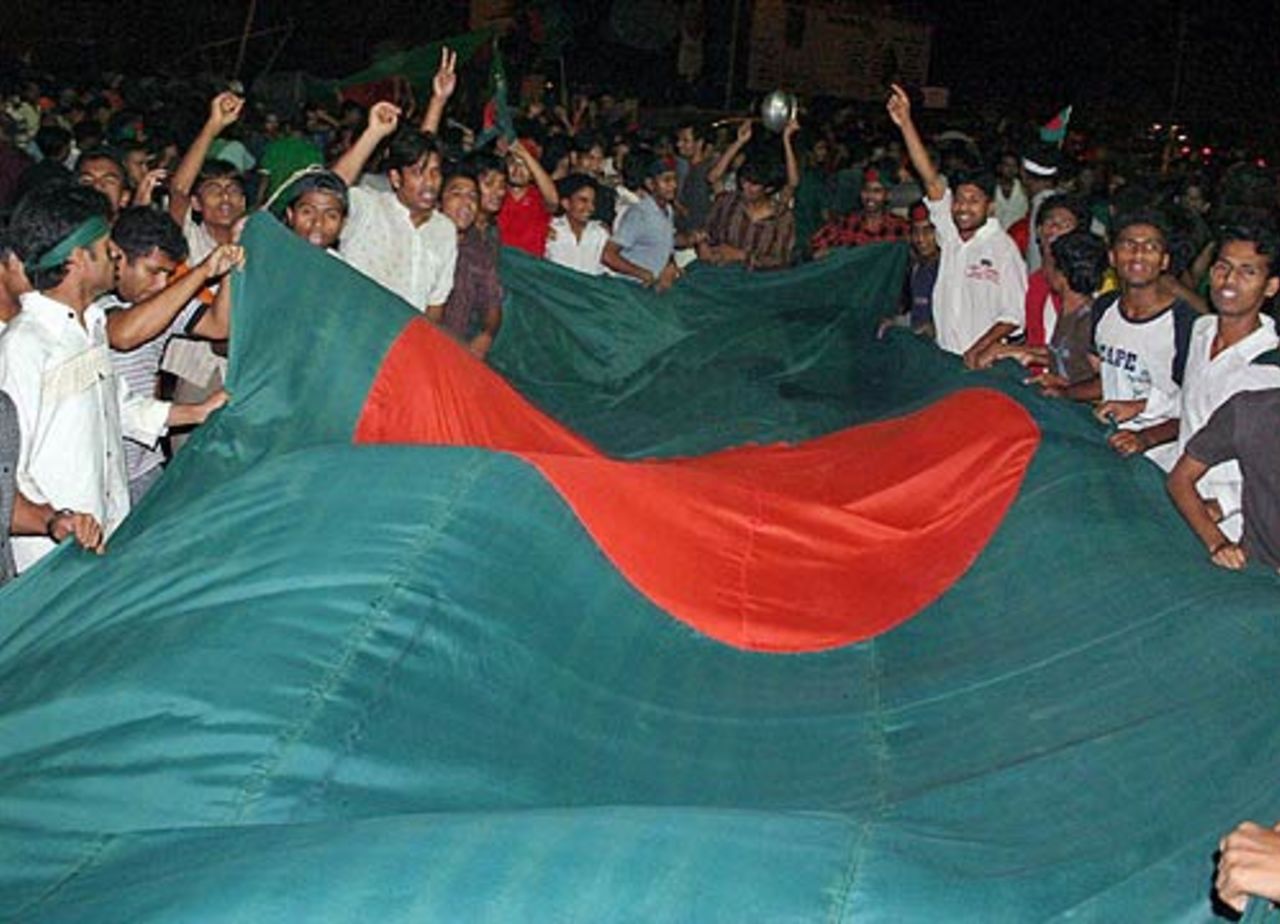 Bangladesh fans celebrate their team's victory against South Africa, Dhaka, April 7, 2007