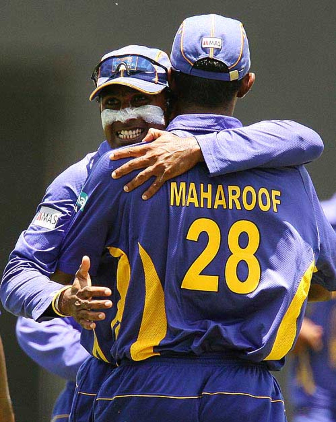 Mahela Jayawardene hugs Farveez Maharoof after he took the catch to dismiss Oram, New Zealand v Sri Lanka, Super Eights, Grenada, April 12, 2007