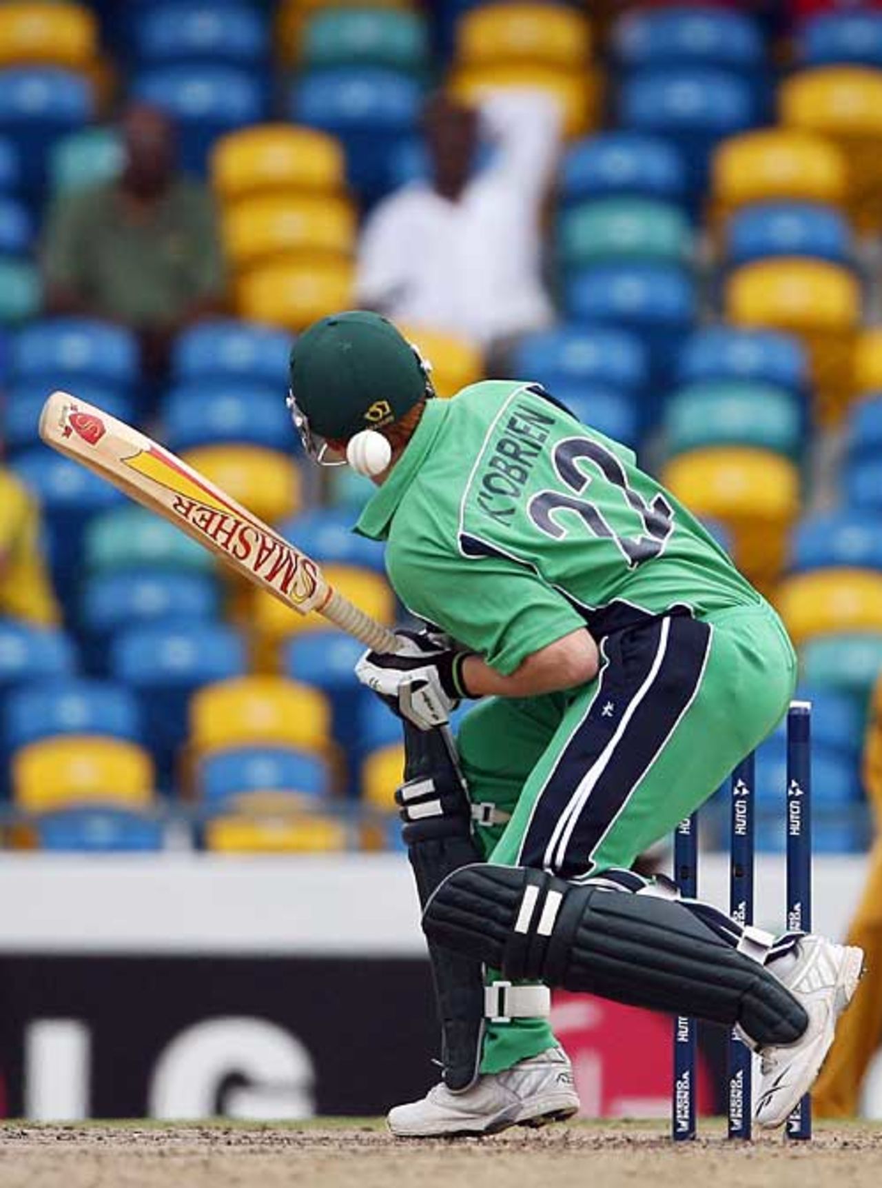 Kevin O'Brien takes a blow from Shaun Tait, Australia v Ireland, Super Eights, Barbados, April 13, 2007