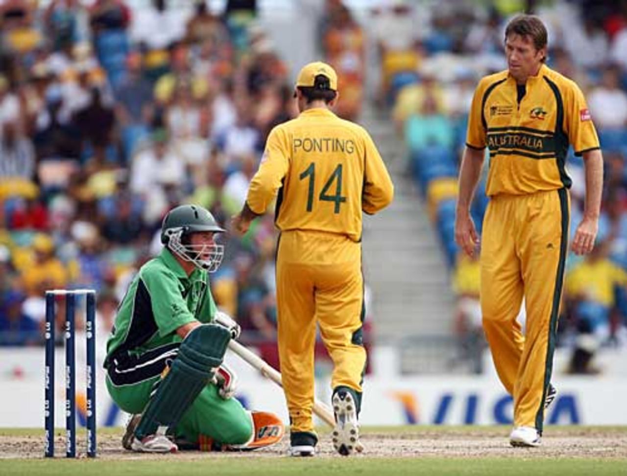 Ricky Ponting and Glenn McGrath show their concern for Andrew White, Australia v Ireland, Super Eights, Barbados, April 13, 2007