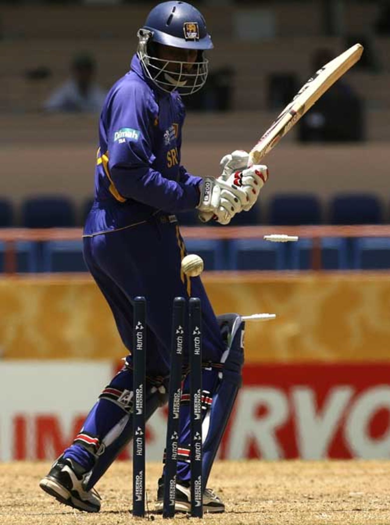 Russell Arnold swings, misses and is cleaned up by Shaun Tait, Australia v Sri Lanka, Super Eights, Grenada, April 16, 2007